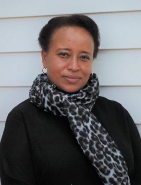 Portrait of Angela Churie Kallhauge, expert in social change and community development.