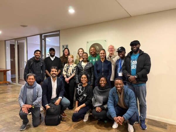 Group photo of diverse participants at IEW 2026 event in Stellenbosch.