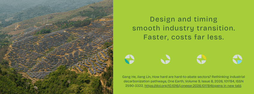 Large solar panel installation on hillside for industrial decarbonization.